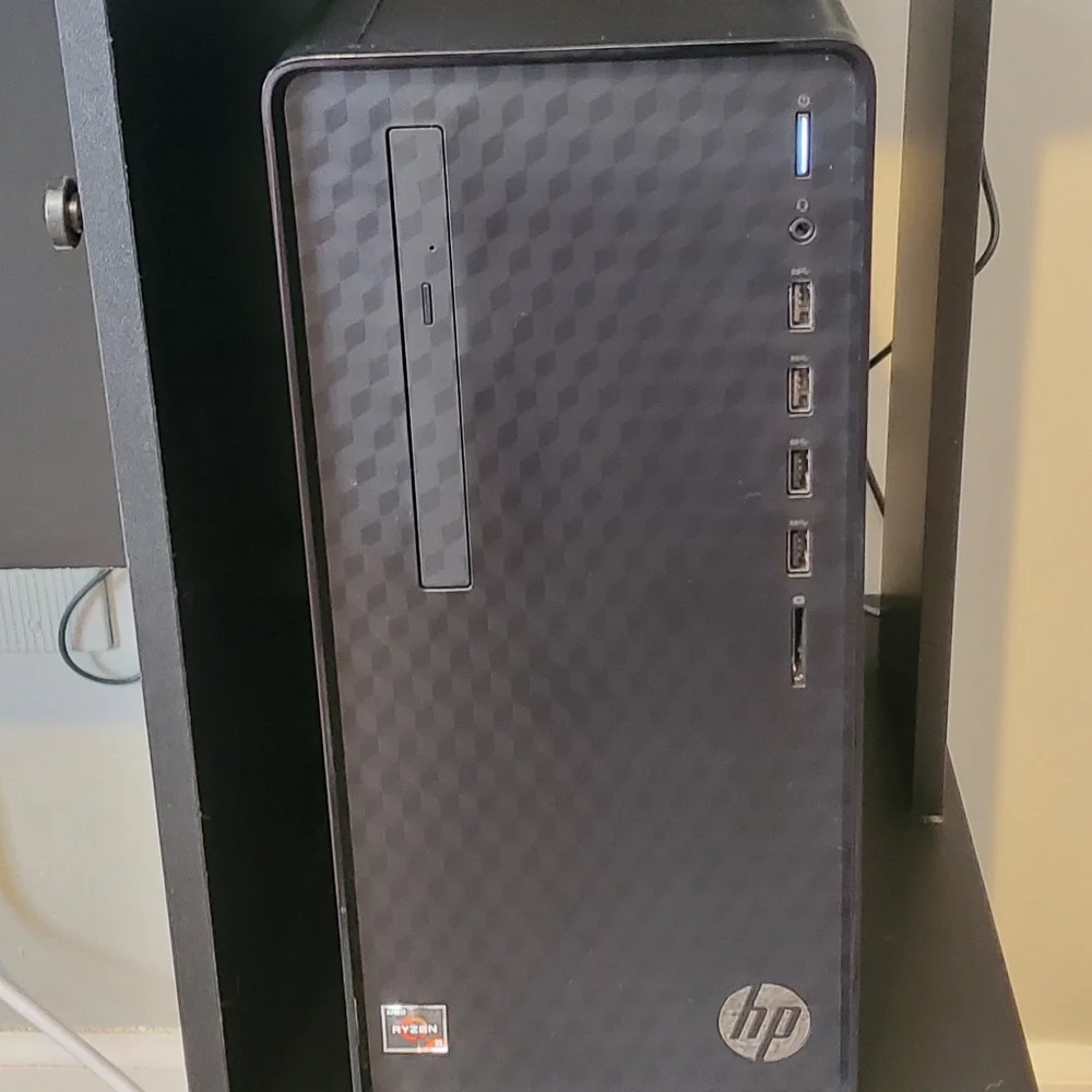 HP Desktop computer with monitor and speakers